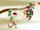 クリスマスのベルとプチケーキのイラストのデスクトップ壁紙 金の背景